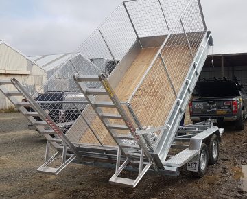 10.5 X 5.5 Tip trailer with cage